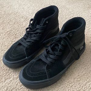 All black high top vans